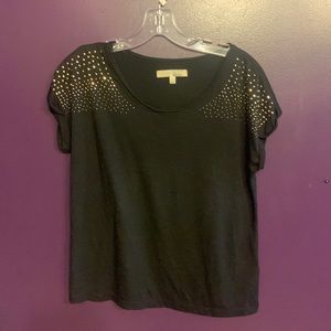 Woman’s bedazzled top